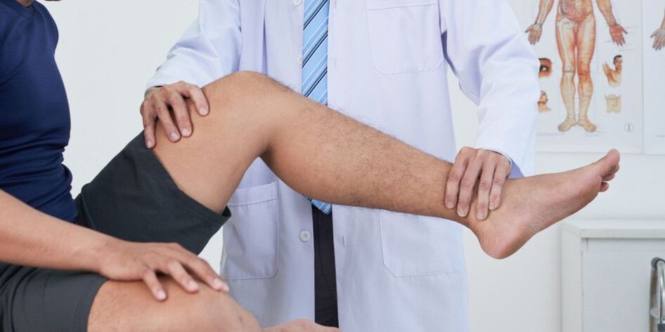 exame do joelho do médico